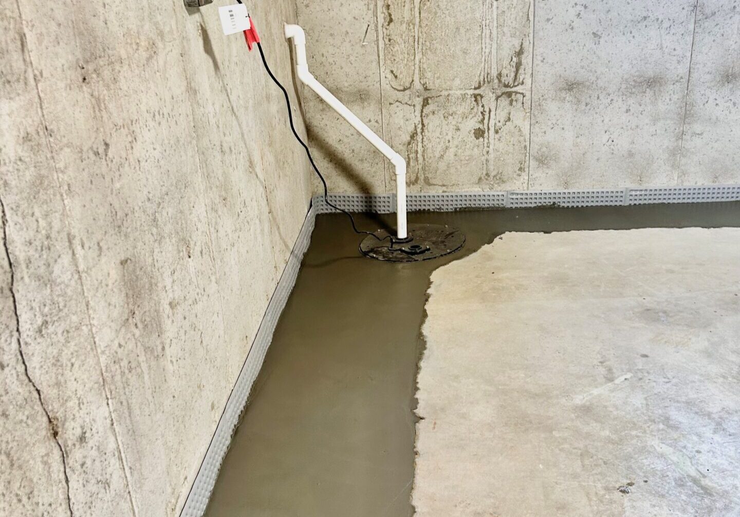 Sump Pump Installation - Basement Waterpoofing St. Louis - Stratum Structural Systems basement waterproofing solution